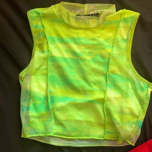Neon green cami crop top. ( If bigger boobs it will give a cute underboob look )